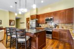Stainless steel appliances and plenty of space to cook